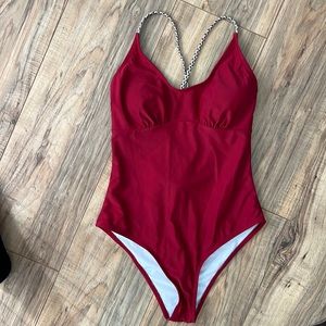 One piece swim suit with tie back
